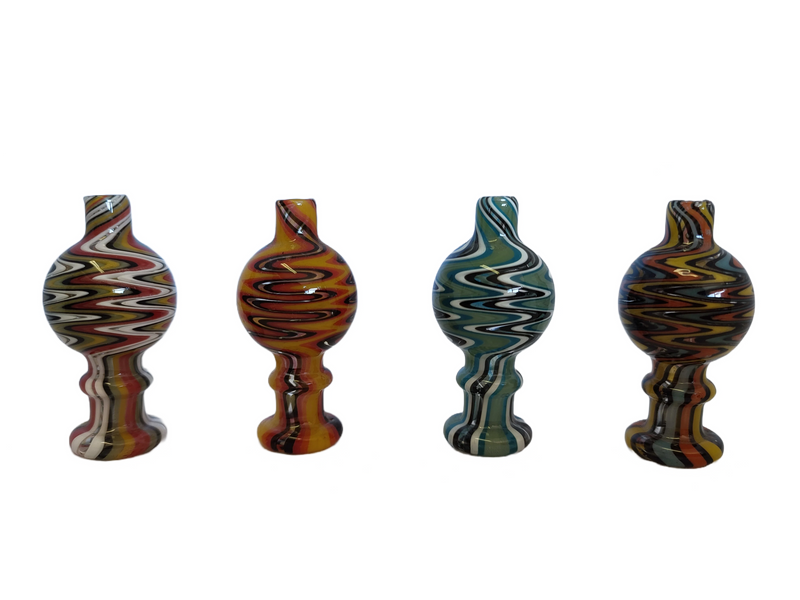 Glass carb cap with functional air holes, enhancing airflow in a dab banger. Color variations available.