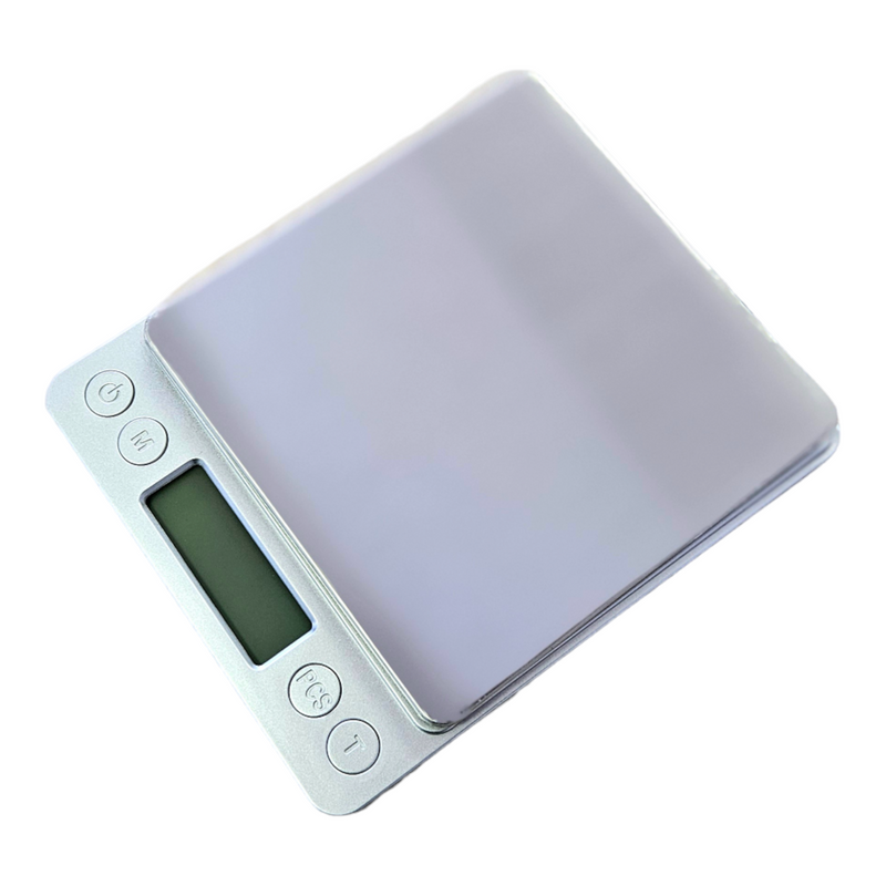 Digital scale with a capacity of 500 grams and precision of 0.05 grams for accurate measurements.